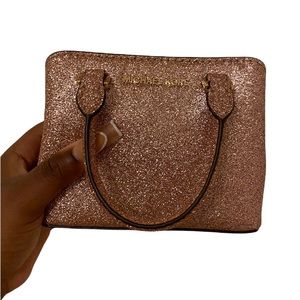 Rose Gold Micheal Kors mini purse with card holder